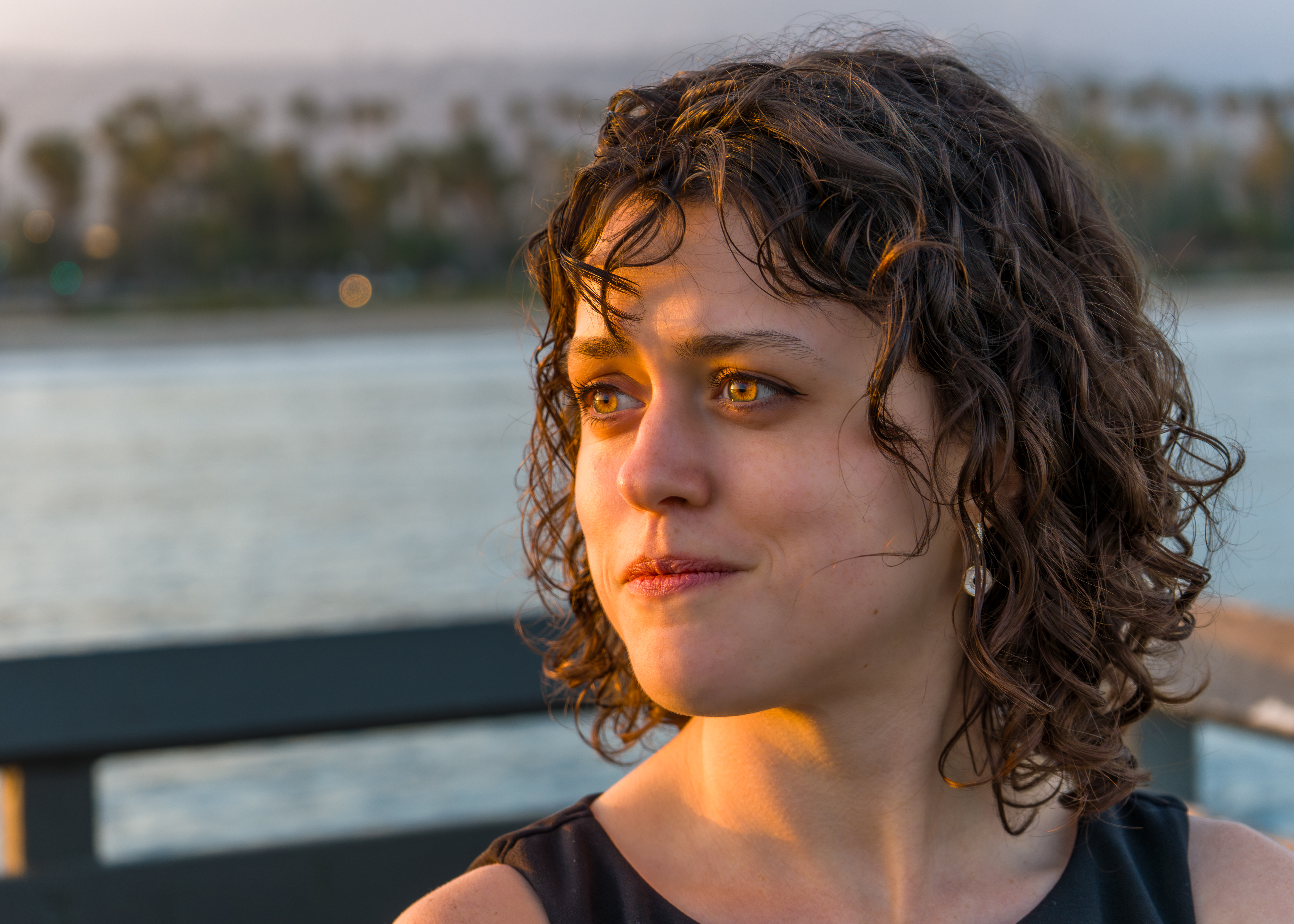 Close portrait of Kaitlin Miller by the water